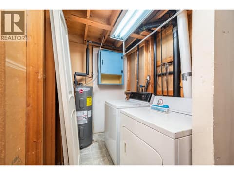 Laundry in basement at 5008 Heritage Drive, Westmount, Vernon