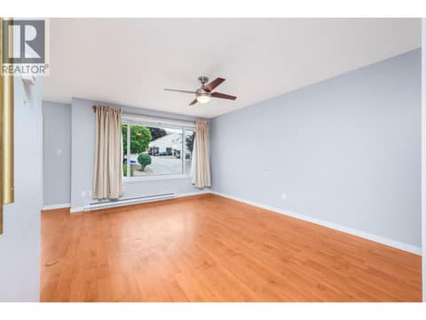 Living room main floor at 5008 Heritage Drive, Westmount, Vernon