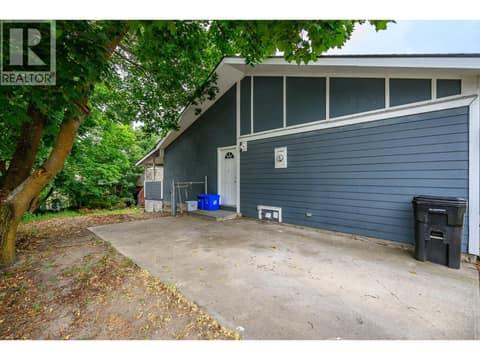 Side entrance to main floor at 5008 Heritage Drive, Westmount, Vernon