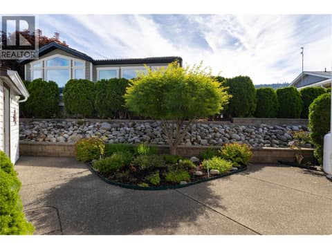 Good sized back yard for outdoor entertaining at 8000 Highland Road Unit# 24, Swan Lake West, Vernon