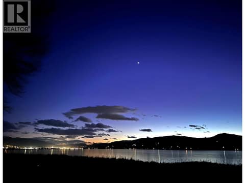 Night view across Swan Lake at 8000 Highland Road Unit# 24, Swan Lake West, Vernon