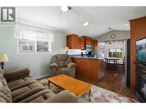 Open concept living room and kitchen at 8000 Highland Road Unit# 24, Swan Lake West, Vernon