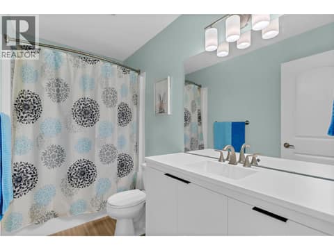 4-piece main bathroom on the upper floor. Laundry is also on the upper floor. at 1651 Lynrick Road Unit# 128, Black Mountain, Kelowna