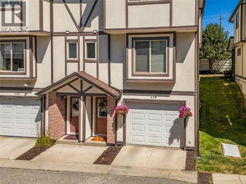 End unit so only 1 common wall and the garage is 1' wider than many in the complex. at 1651 Lynrick Road Unit# 128, Black Mountain, Kelowna