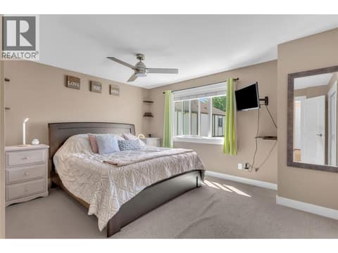 Primary suite on the upper floor. Plenty of room for a king bed. at 1651 Lynrick Road Unit# 128, Black Mountain, Kelowna
