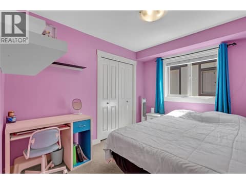 Second bedroom on the upper floor. at 1651 Lynrick Road Unit# 128, Black Mountain, Kelowna
