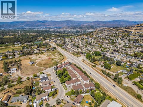 The bare ground area to the left is the proposed Black Mountain Village Center. at 1651 Lynrick Road Unit# 128, Black Mountain, Kelowna