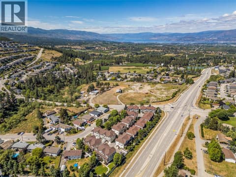 The drone view back down Hwy 33 towards Rutland. at 1651 Lynrick Road Unit# 128, Black Mountain, Kelowna