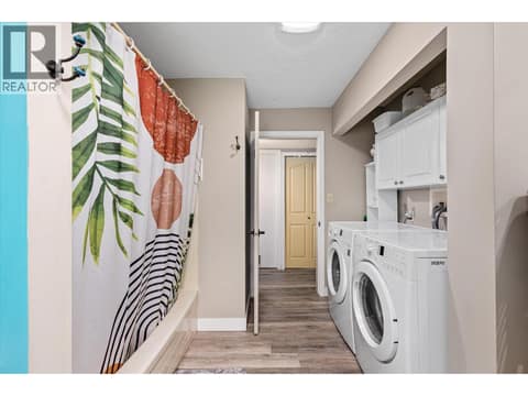 Convenient large bathroom with laundry. at 14262 Harmen Road, Lake Country East / Oyama