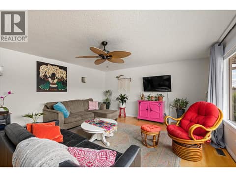 Living Room with a picture window overseeing the beautiful views. at 14262 Harmen Road, Lake Country East / Oyama