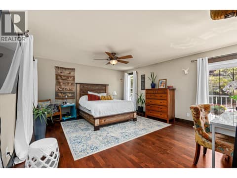Primary bedroom feels like a sanctuary of your own. at 14262 Harmen Road, Lake Country East / Oyama
