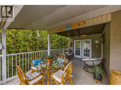 Primary bedroom private access to the covered deck. at 14262 Harmen Road, Lake Country East / Oyama