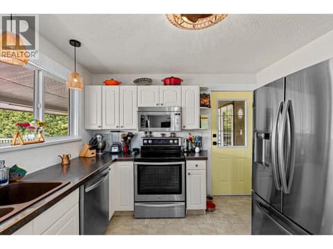 Stainless steel appliances. at 14262 Harmen Road, Lake Country East / Oyama