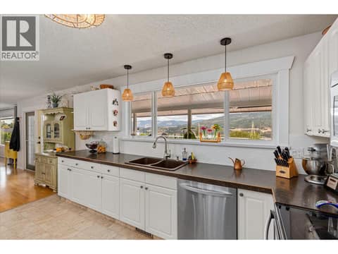 White and bright kitchen, enjoy views while you are preparing a meal. at 14262 Harmen Road, Lake Country East / Oyama
