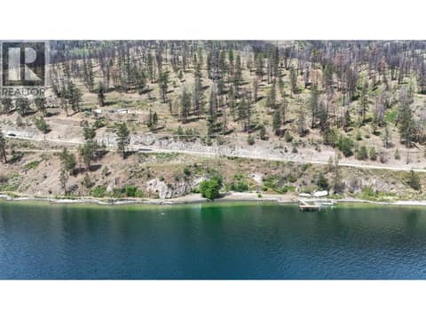Straight on view of frontage and dock at 2181 Westside Road N, Westside Road, Kelowna