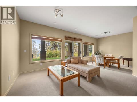 Family room at 4520 GALLAGHERS Lookout Unit# 2, South East Kelowna