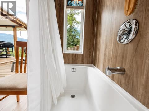 Bath with a view at 87 Dolly Varden Road, Ashton Crk/Mabel Lk, Enderby