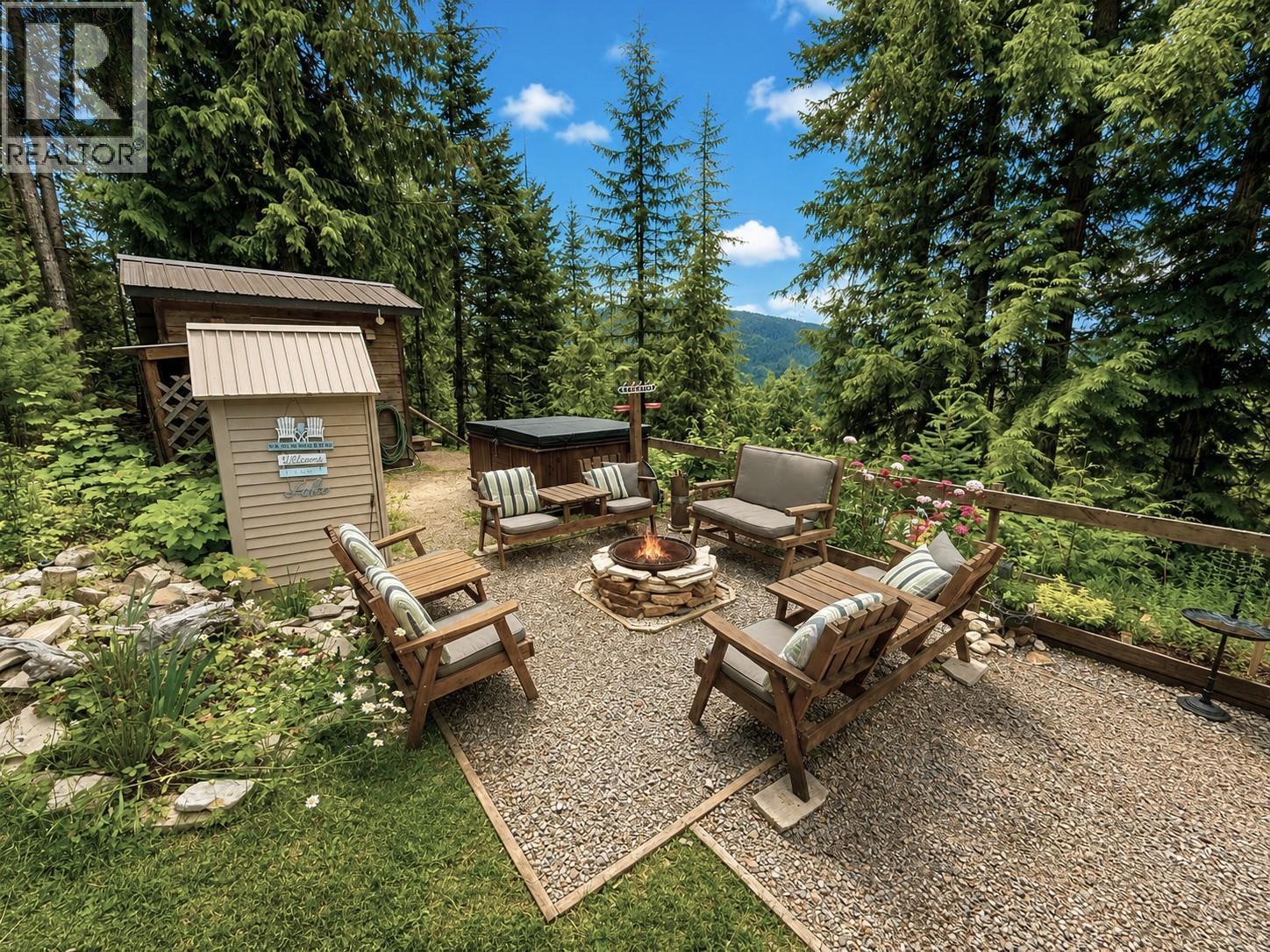 Entertaining in winter or summer with a cozy firepit at 87 Dolly Varden Road, Ashton Crk/Mabel Lk, Enderby