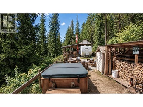 Hot tub with sunset views at 87 Dolly Varden Road, Ashton Crk/Mabel Lk, Enderby