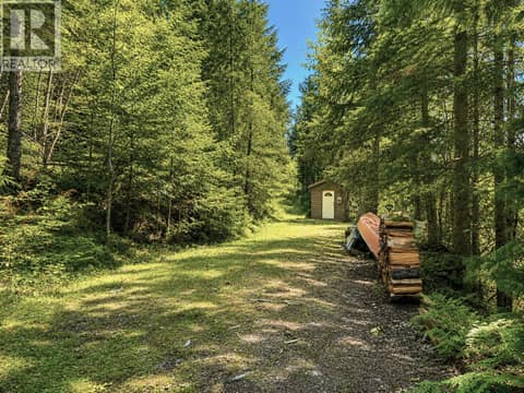 The shed is the nextdoor neigbours. so about maybe 6 feet from it is the parcel boundaries ( Electric Pole is on this parcel to the road) at 87 Dolly Varden Road, Ashton Crk/Mabel Lk, Enderby