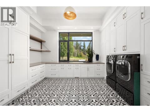 Main floor LAundry at 4425 Twin Creek Place, Ellison, Kelowna