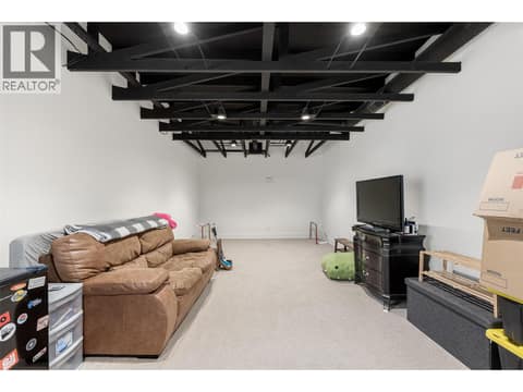 Main Home Upstairs Suite Rec Media at 4425 Twin Creek Place, Ellison, Kelowna