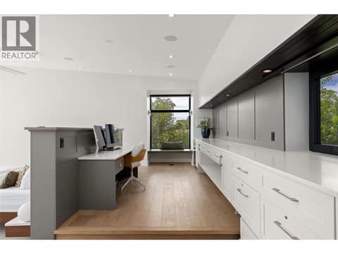Main Primary Bed raised office at 4425 Twin Creek Place, Ellison, Kelowna