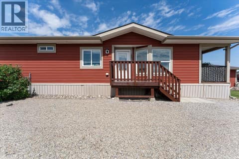 Front door entrance, on left of home. at 12560 Westside Road Unit# 51, Swan Lake West, Vernon