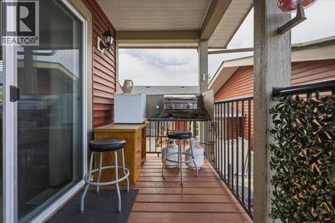 Front porch perfect for BBQing at 12560 Westside Road Unit# 51, Swan Lake West, Vernon