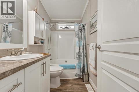 Full bathroom with tub at 12560 Westside Road Unit# 51, Swan Lake West, Vernon