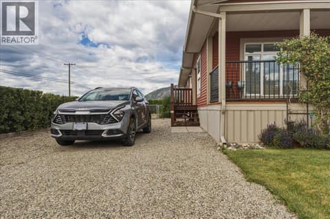 Full driveway plus extra RV/boat parking on your own lot. at 12560 Westside Road Unit# 51, Swan Lake West, Vernon