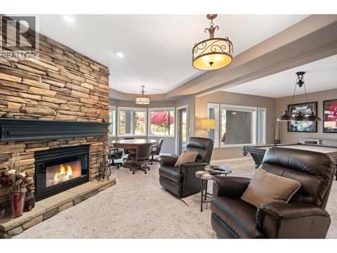 Recreation room with fireplace at 3907 Gallaghers Circle, South East Kelowna