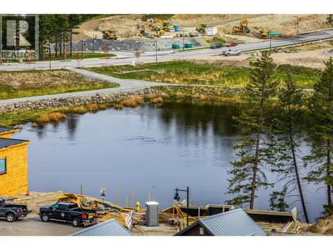 Overlooking Arrowleaf pond at 3165 Hilltown Drive, McKinley Landing, Kelowna