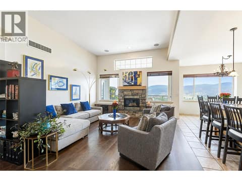 Living Room-Cozy Fireplace/High ceilings at 1950 CAPISTRANO Drive Unit# 133, University District, Kelowna