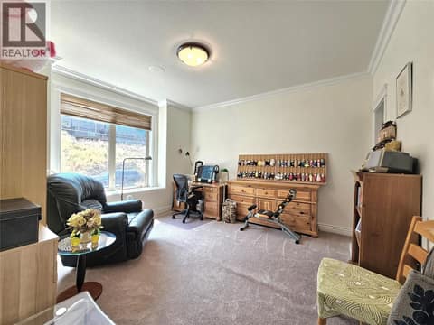Main floor 2nd bedroom at 1494 Montenegro Drive, Black Mountain, Kelowna