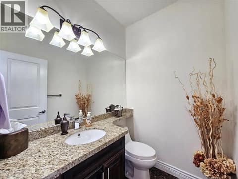 Powder room at 1494 Montenegro Drive, Black Mountain, Kelowna