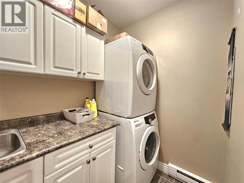 Suite laundry at 1494 Montenegro Drive, Black Mountain, Kelowna