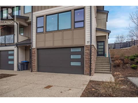 Parking for 2 vehicles plus a double garage! at 12798 Lake Hill Drive Unit# 37, Lake Country North West