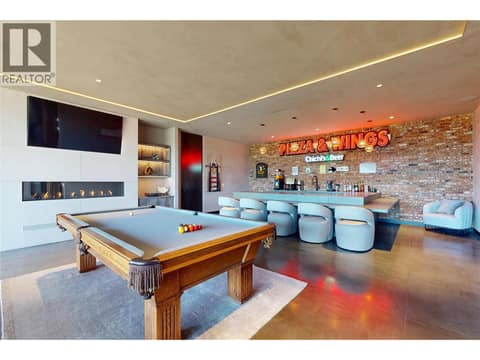 Lower level rec room with bar at 4275 Todd Road, South East Kelowna