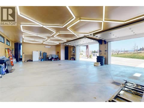 Oversized x2 double garage doors with mini-split heating and cooling at 4275 Todd Road, South East Kelowna