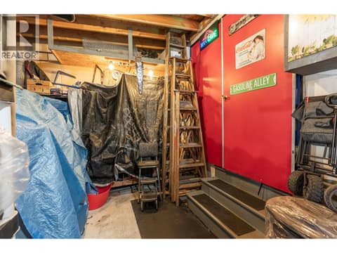 Entrance to man cave in garage (red door) at 9020 Jim Bailey Road Unit# 48 Lot# 48, Lake Country East / Oyama, Kelowna