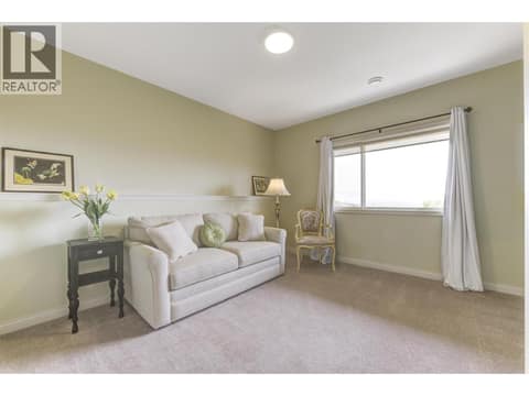 1 of 2 lower bedrooms at 5205 Sandhills Drive, Ellison, Kelowna