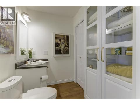 Half bath on main off of garage at 5205 Sandhills Drive, Ellison, Kelowna