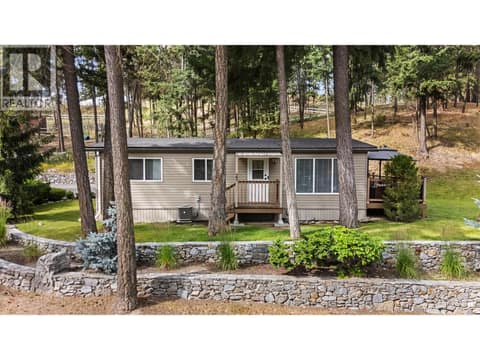 A charming side porch welcomes family and friends. at 4075 McClain Road Unit# 22, South East Kelowna