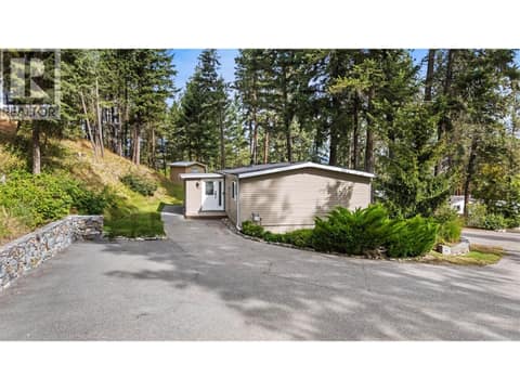 Ample parking, a detached workshop, and easy access make everyday living effortless. at 4075 McClain Road Unit# 22, South East Kelowna