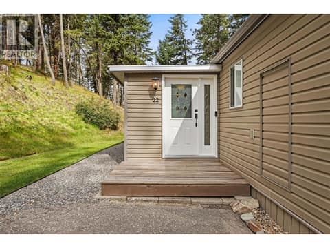 An inviting front entrance is just the beginning of everything this home has to offer. at 4075 McClain Road Unit# 22, South East Kelowna