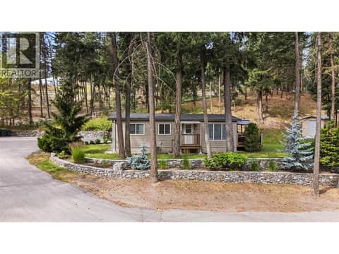 Arrive home to your own private retreat surrounded by mature trees and beautifully manicured landscaping. at 4075 McClain Road Unit# 22, South East Kelowna