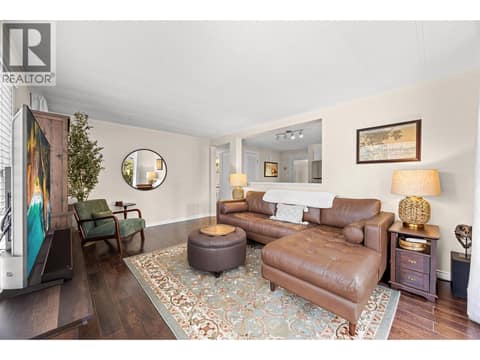 Thoughtfully designed with comfortable gathering spaces, this inviting living room is perfect for quiet evenings or hosting guests. at 4075 McClain Road Unit# 22, South East Kelowna
