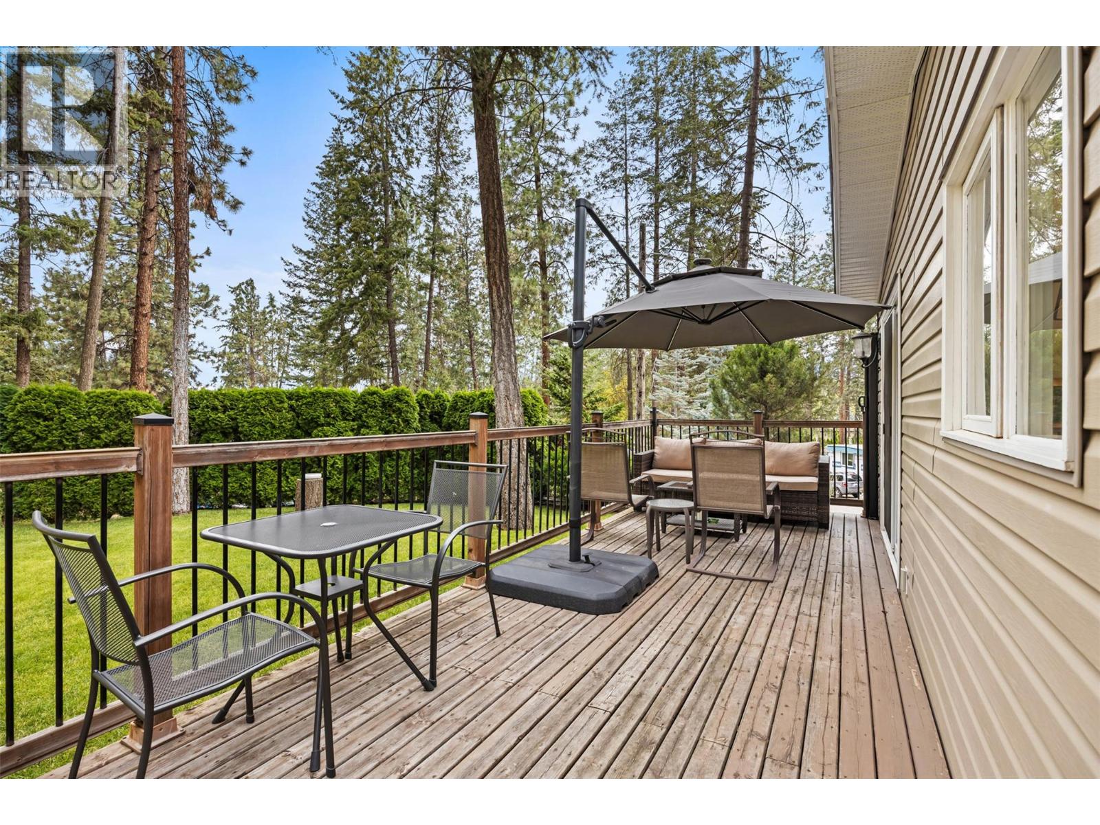 With space to dine, barbecue, and lounge, this spacious deck is designed for effortless outdoor entertaining. at 4075 McClain Road Unit# 22, South East Kelowna