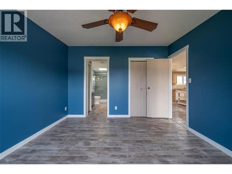 Master bedroom with walk in closet at 9510 Highway 97 N Unit# 26, Swan Lake West, Vernon